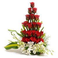 Online Valentine's Day Flowers to Vijayawada including 4 Orchids 20 Roses Arrangement
