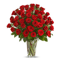 Valentine's Day Flowers to Vishakhapatnam Same Day Delivery : Red Roses in Vase 75 Flowers in Hyderabad