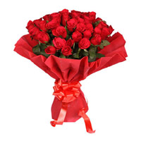 Red Rose Bouquet in Crepe 50 Flowers in Hyderabad. Friendship Flowers to Hyderabad